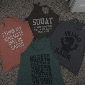 Set of four graphic workout tanks